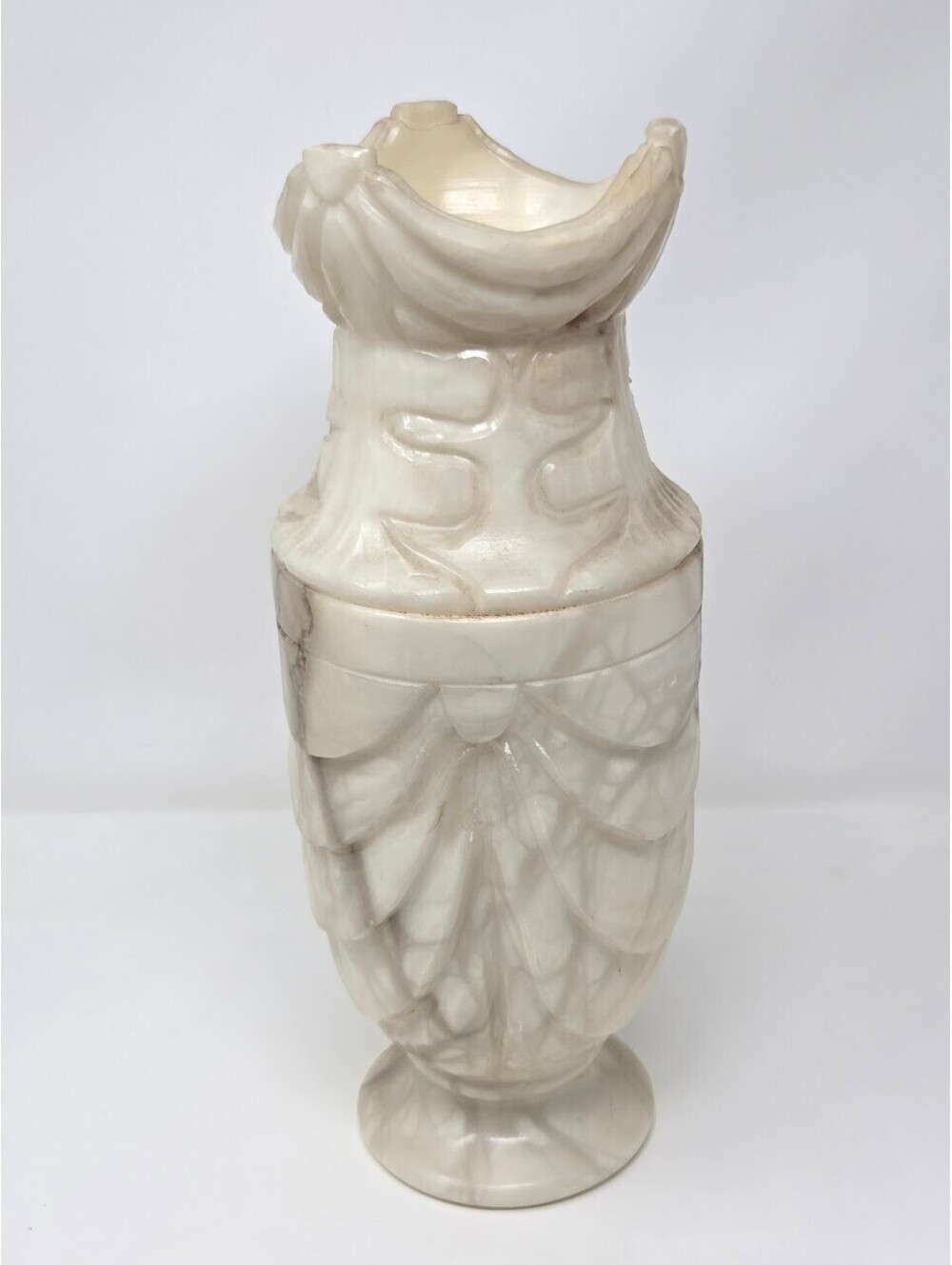 Hand-Carved Alabaster Vase With Draped Relief Motif And Pedestal Base